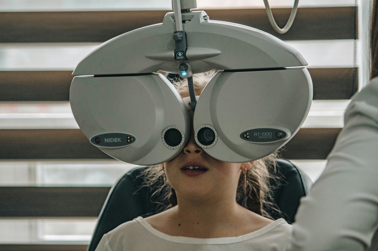 An eye examination with a phoropter